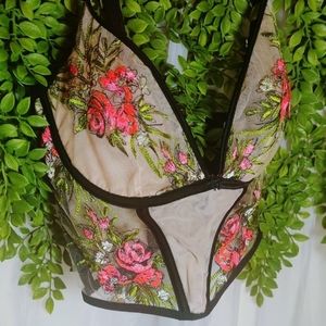 elegant floral nude bustier top with black trim